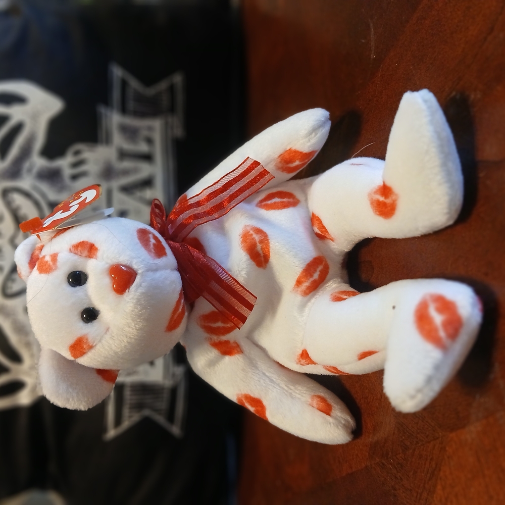 White and Orange Plush Bear